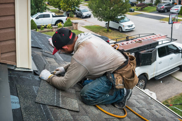 Professional Roofing technician working in Chino, CA